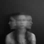 a confused woman facing both ways