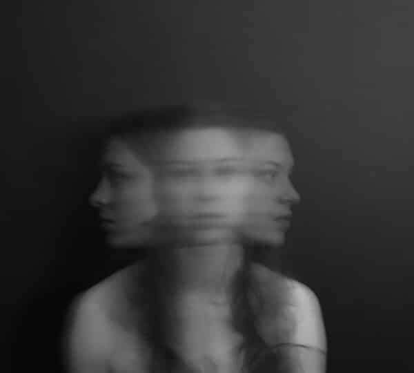a confused woman facing both ways