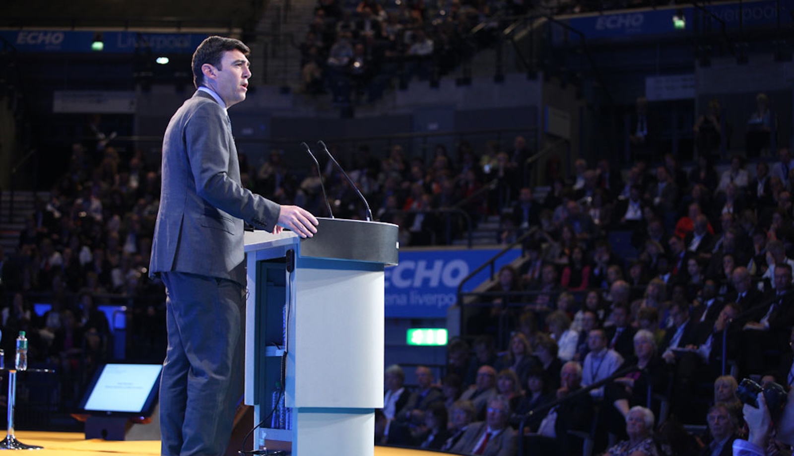 photo of Andy Burnham speaking to a conference